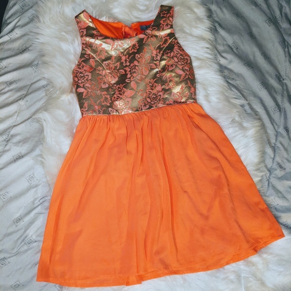 coral and gold dress